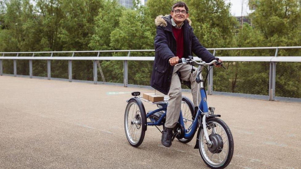 Man riding e-bike