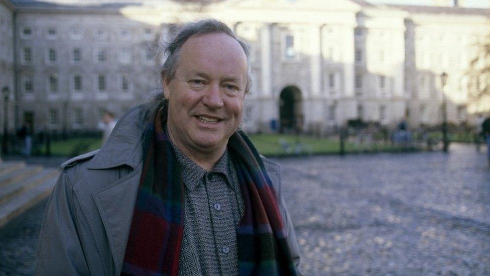 Brendan Kennelly outside Trinity College Dublin