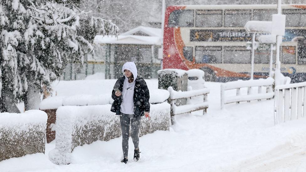 Woman in the snow in Scotland in January 2023