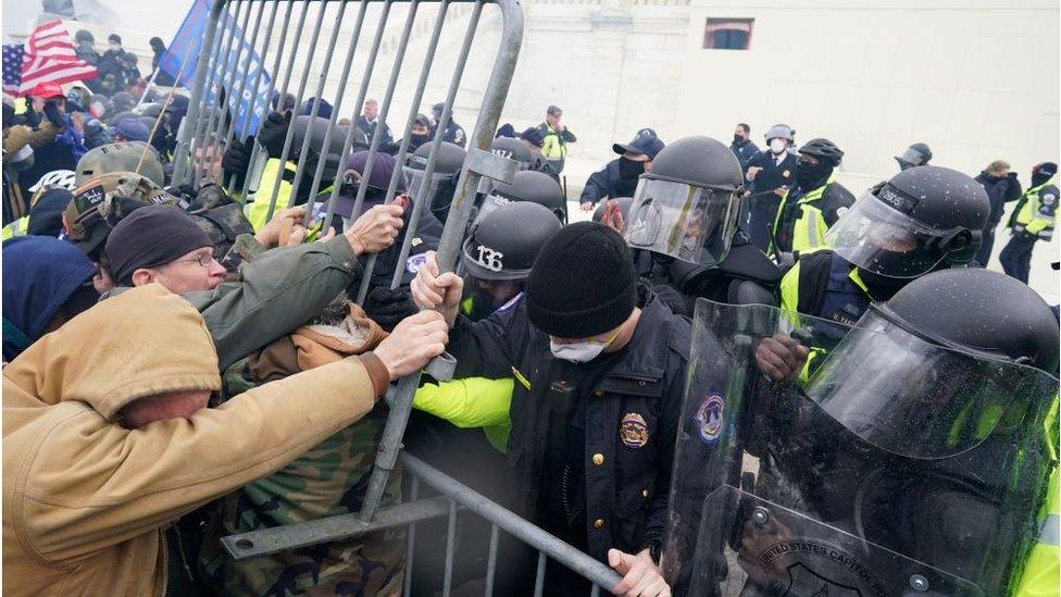 Protestors storming the US Capitol in January