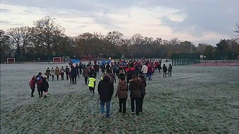 Parents and pupils set off on the walk