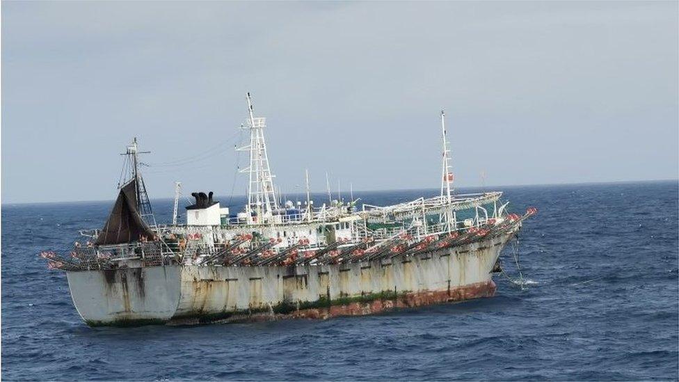 One vessel, part of a fleet of hundreds of Chinese fishing boats, sails in Pacific Ocean international waters near Chile's exclusive economic maritime zone, on the outskirts of the coast of Arica and Parinacota region November 30, 2020.