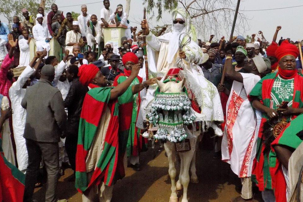 The Emir of Kano Muhammadu Sanusi II departs on horseback from the Eid prayer ground in Kano, Nigeria - 25 June 2017