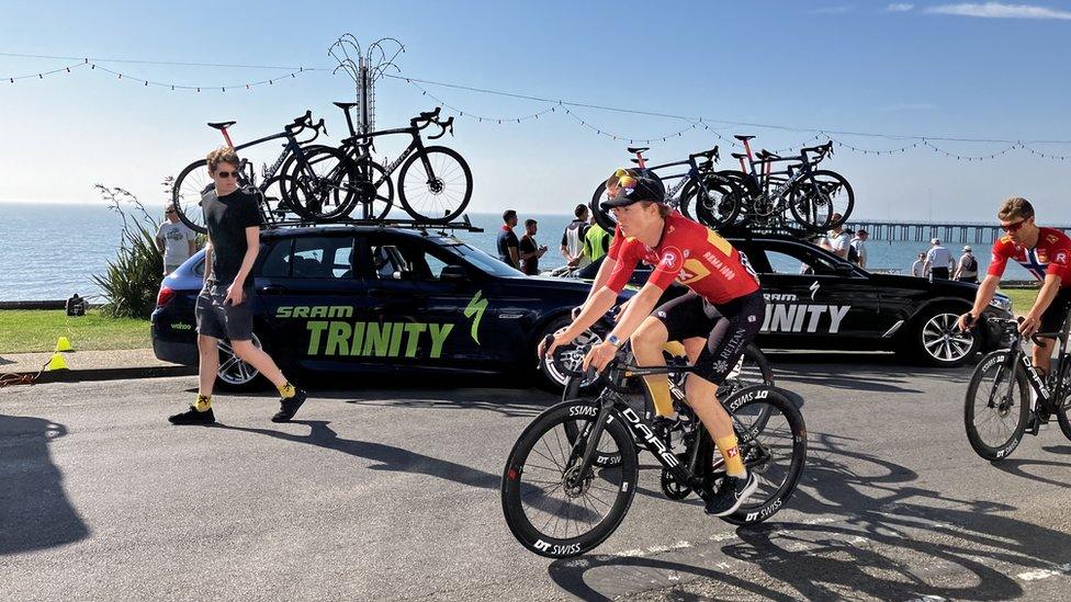 Cyclists ride alongside the Felixstowe coast