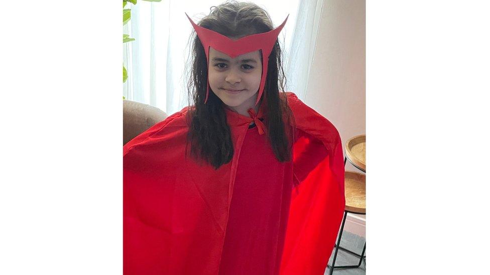 Girl dressed up as The Scarlet Witch