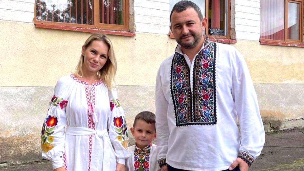 Nataliya Hevak with young son and husband