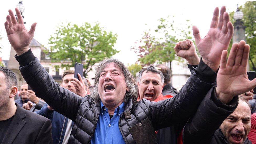 Supporters of Ramush Haradinaj outside the court in Colmar on 27 April