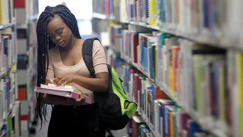 A female student at the library