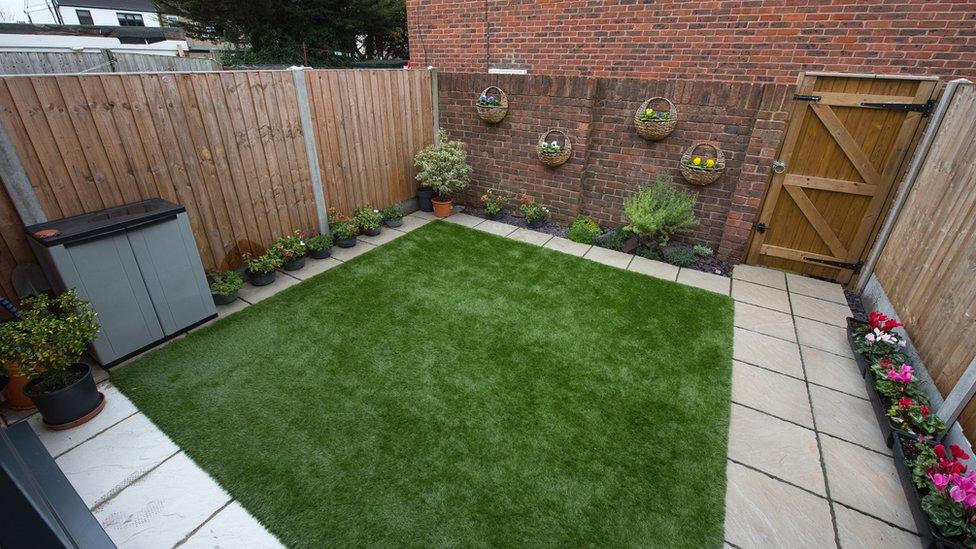 Artificial grass in a back garden