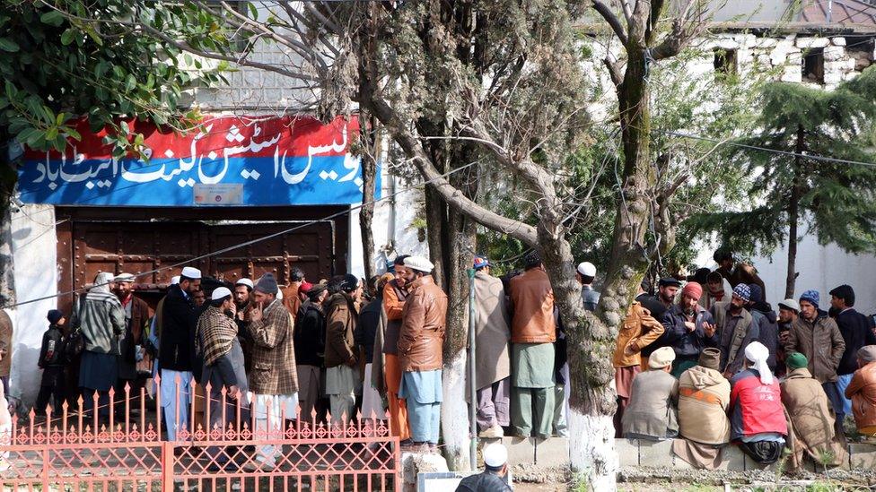 Relatives gather outside the police station to receive the body of Afzal Kohistani, the man who exposed the 2012 Kohistan video scandal, first to the media and then the court, after he was killed by unknown gunmen in Abbottabad, Pakistan, 07 March 2019