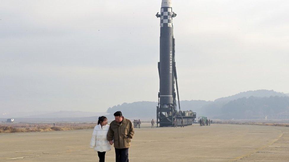 Kim Jong with his daughter