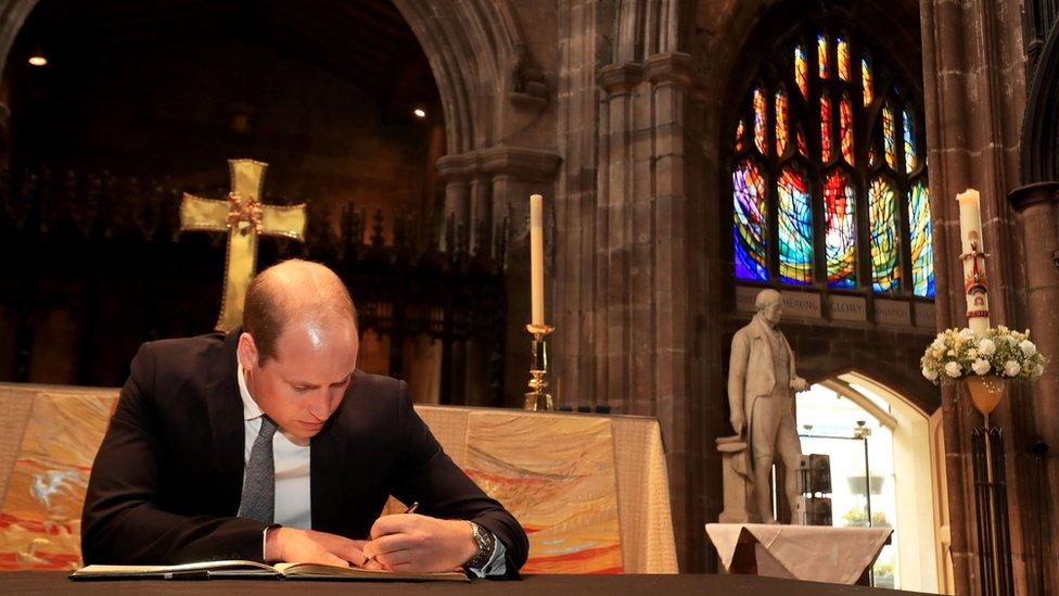 Prince William signing book of condolence