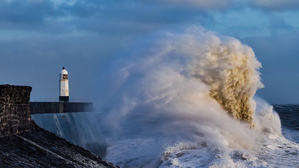 Storm causes large waves to hit coastal pier