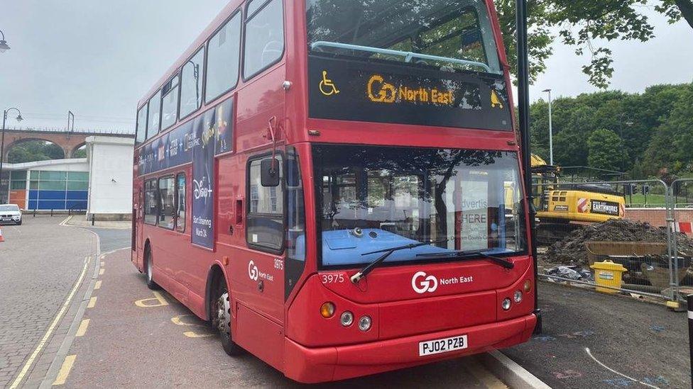 A red Go North East bus in Chester-le-Street