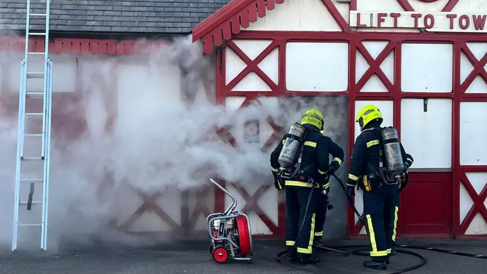 Smoke could be seen coming from the railway's building