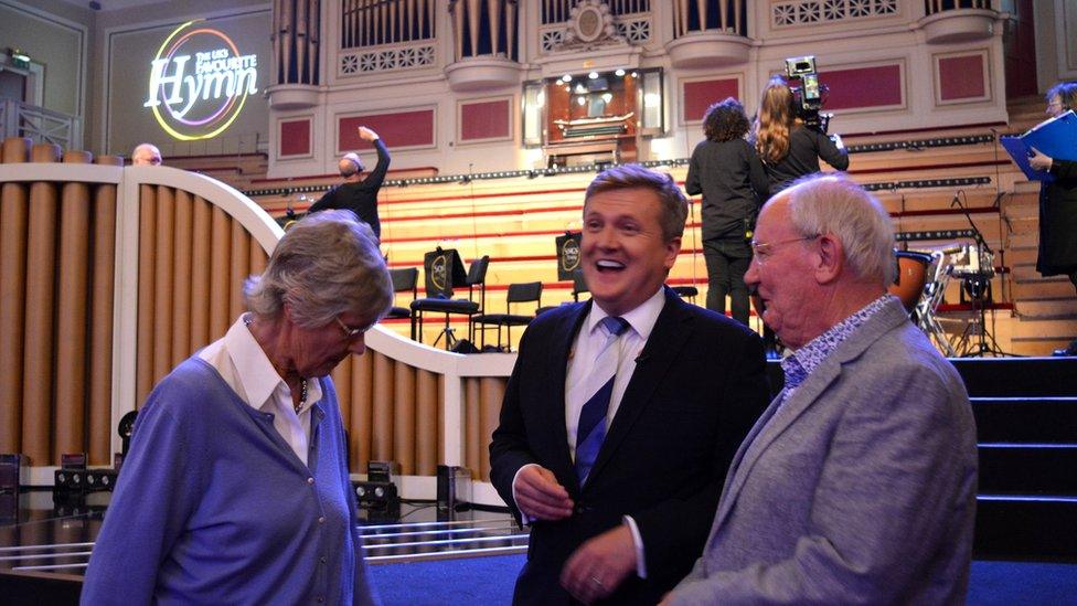 Trevor and Christine joke with presenter Aled Jones