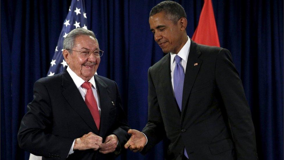 US President Barack Obama extends his hand to Cuban President Raul Castro at the start of their meeting at the United Nations General Assembly in New York in September