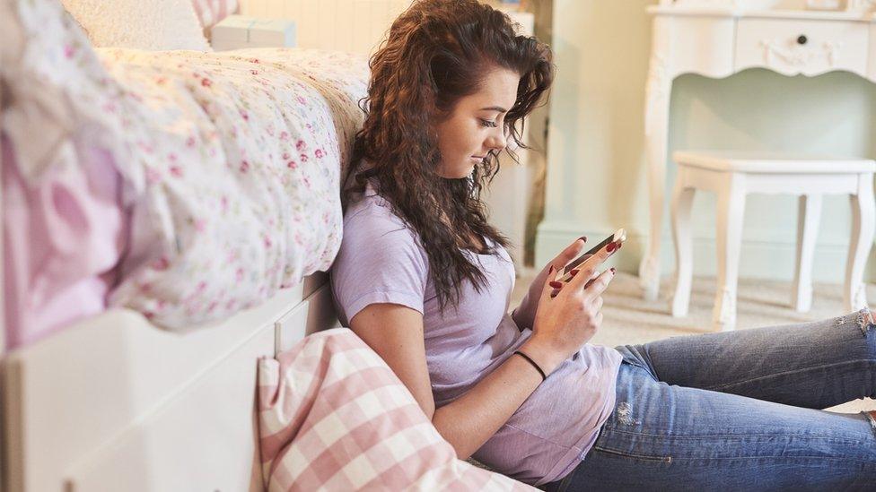 Teenage girl on phone