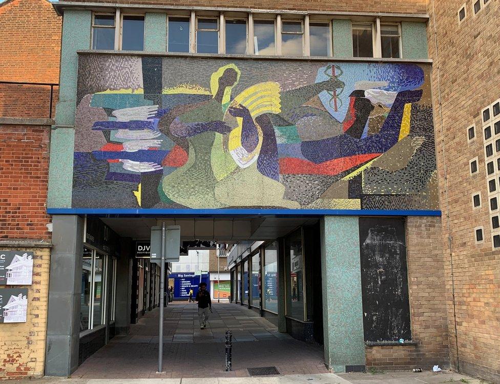 A 1960s mural on the Ipswich Co-op building