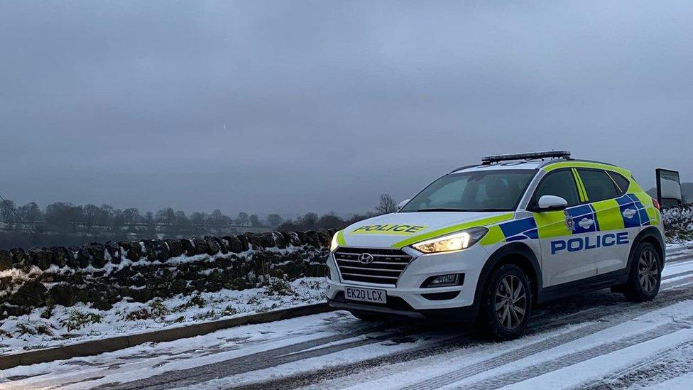 Police car in the snow