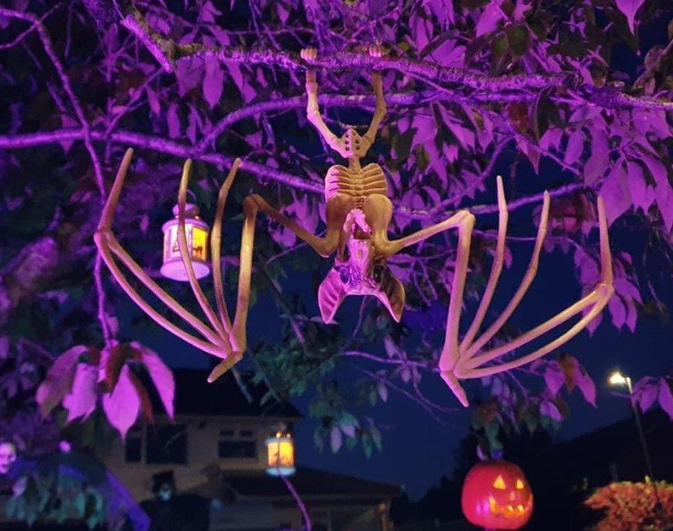 Bat model hanging in a tree