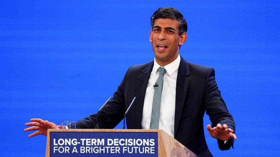 Rishi Sunak speaking at the Conservative party conference in Manchester