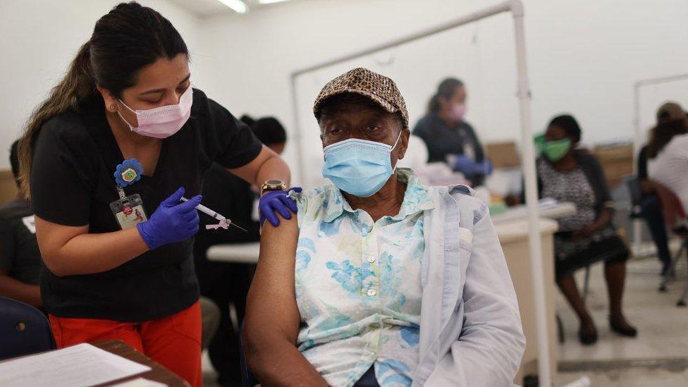 Man receives Moderna covid vaccine