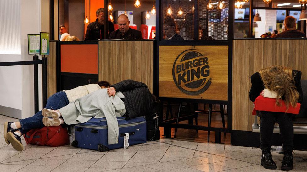 Passengers waiting at London Luton