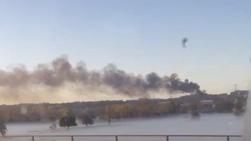 Large plumes of smoke across the sky near the quarry