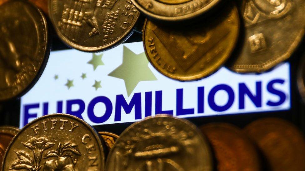 Euromillions logo and coins