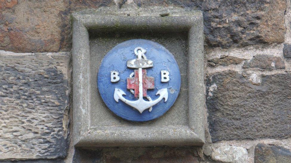 BB crest on a wall