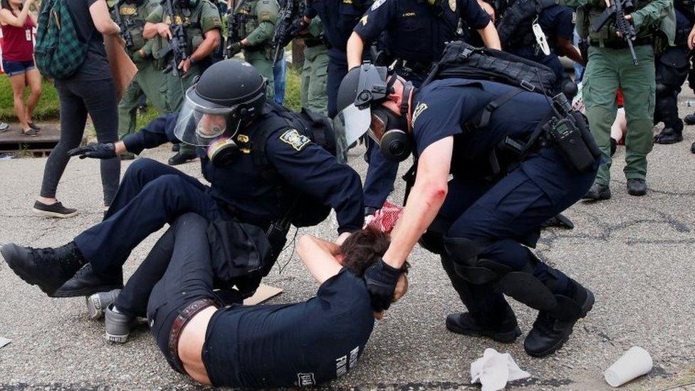 Police detain a demonstrator in Baton Rouge. Photo: 10 July 2016