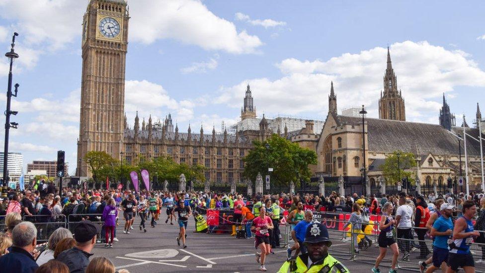 London Marathon runners pass Big Ben