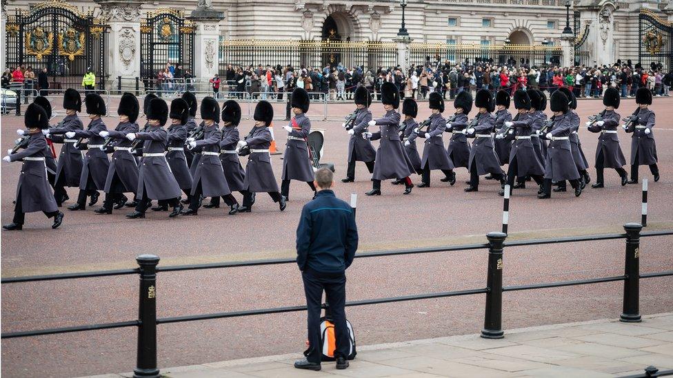 The changing of the guard ceremony outside Buckingham Palace