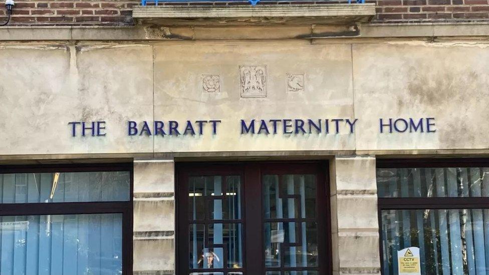 Stone building with "The Barratt Maternity Home" above the door