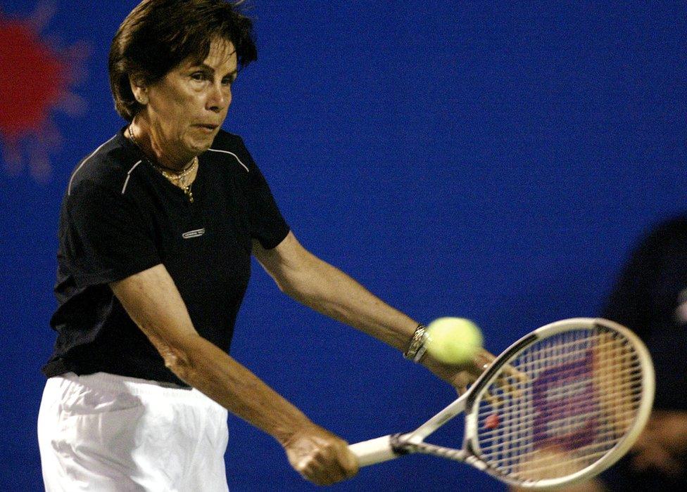 Maria Esther Bueno, winner of 19 Grand Slam singles and doubles titles from 1959-68, plays during a tennis exhibition on Copacabana beach in Rio de Janeiro, Brazil, 10 December 2005