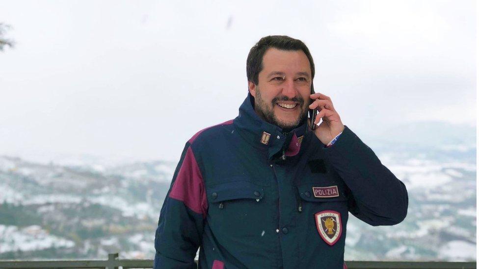 Matteo Salvini pictured wearing a police badge