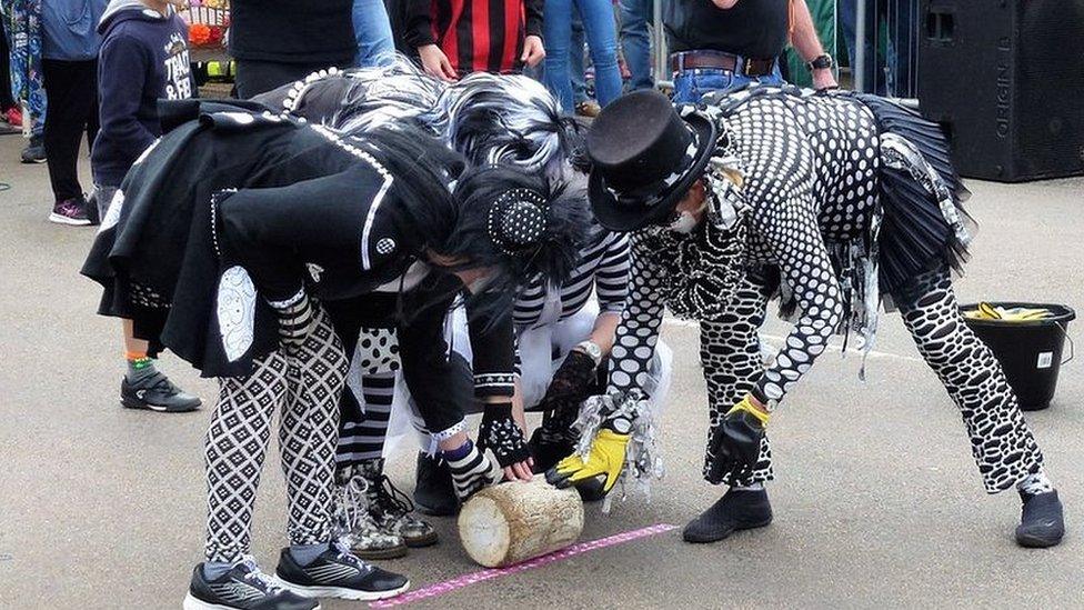 A team at the start line of the 2017 chees rolling event