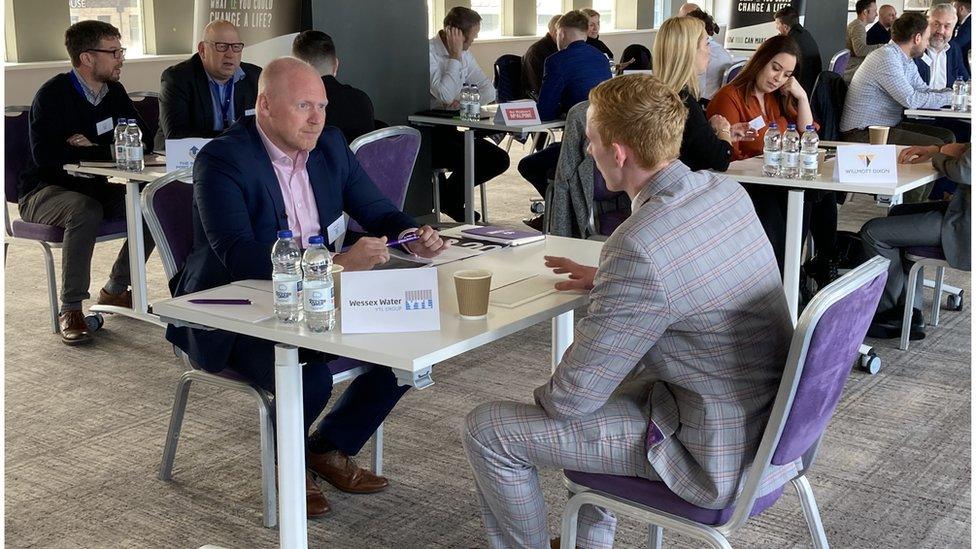 Ben Williams having an interview at an employer workshop