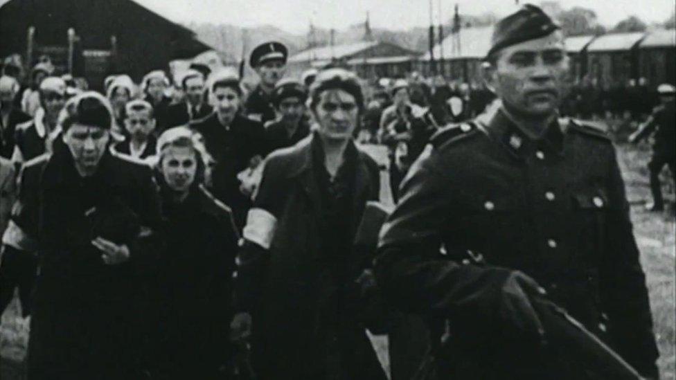 Polish civilians under Nazi control in Warsaw