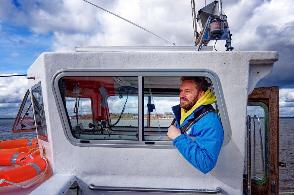 Christian Zemann on his ferry