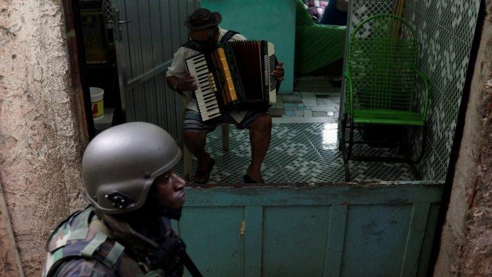 Armed Forces take up position during a operation after violent clashes between drug gangs in Rocinha slum in Rio de Janeiro, Brazil, September 22, 2017. REUTERS