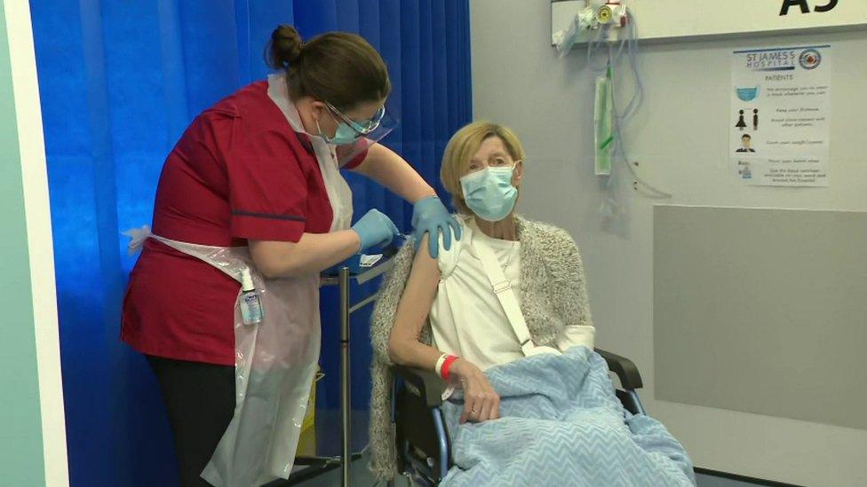 Annie Lynch receives a Covid-19 vaccine