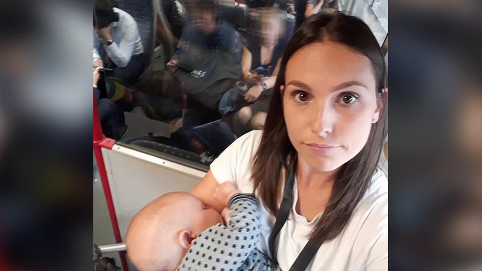 Kate Hitchens breastfeeding on train