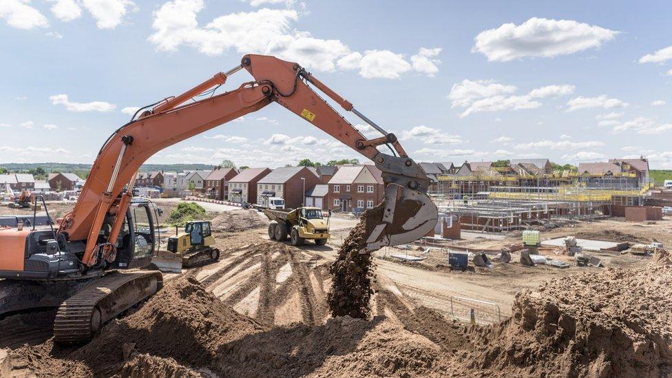 An excavator working on a building site