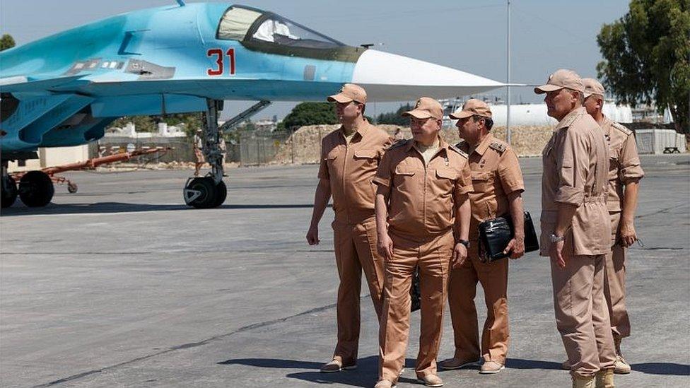 Russian Defense Minister Sergei Shoigu (second left) at the Hemeimeem air base in Syria (July 2016)