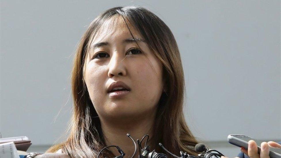 Chung Yoo-ra, the 21-year-old daughter of Choi Soon-sil, answers questions from the press after arriving at the Incheon International Airport in Incheon, South Korea, May 31, 2017.