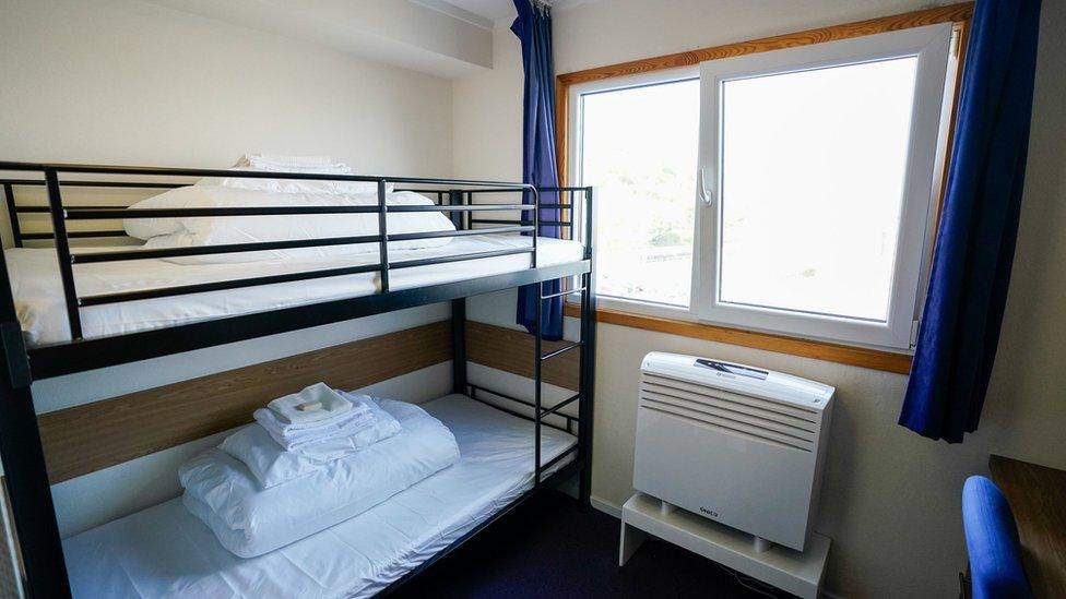 A view of inside one of the bedrooms onboard the Bibby Stockholm accommodation barge at Portland Port in Dorset