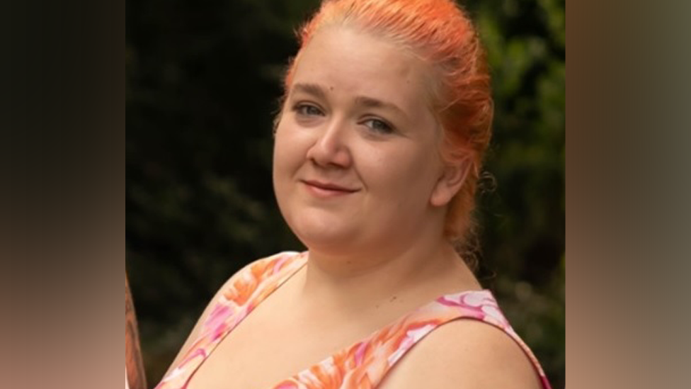 A close up photo of Rhiannon Whyte, showing her with orange/red hair