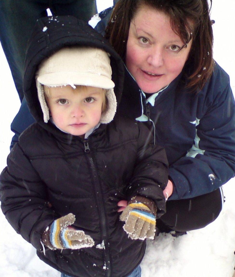 Zach with his mother